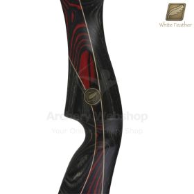 The White Feather Handle Firefinch is shown resting on a display surface, drawing attention to the rich color contrast and smooth contours of the wooden riser. The camera focuses on the grip and limb pockets, illustrating how the ILF interface integrates 