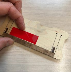 Wooden Wrap Aligner for precise arrow wrap alignment. Use this tool to apply wraps perfectly straight every time. Suitable for wraps up to 6.5 in (16.5 cm) and recommended for spin vane setups. Perfect for professional or club use. Need details or measure